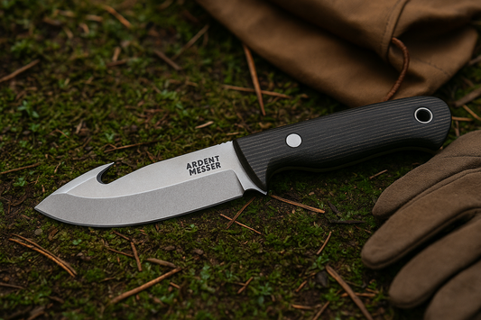Gut hook knife on forest ground next to game bag and gloves
