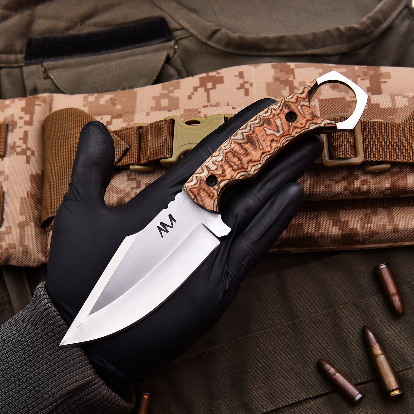 AM Onyx Camping and Outdoor Knife close up in hand showing blade and handle details
