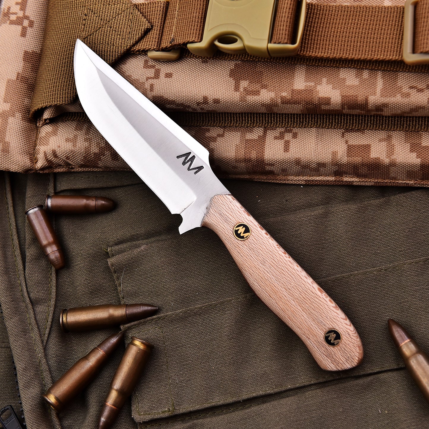 Fixed Blade Tactical & Survival Knife on a military background
