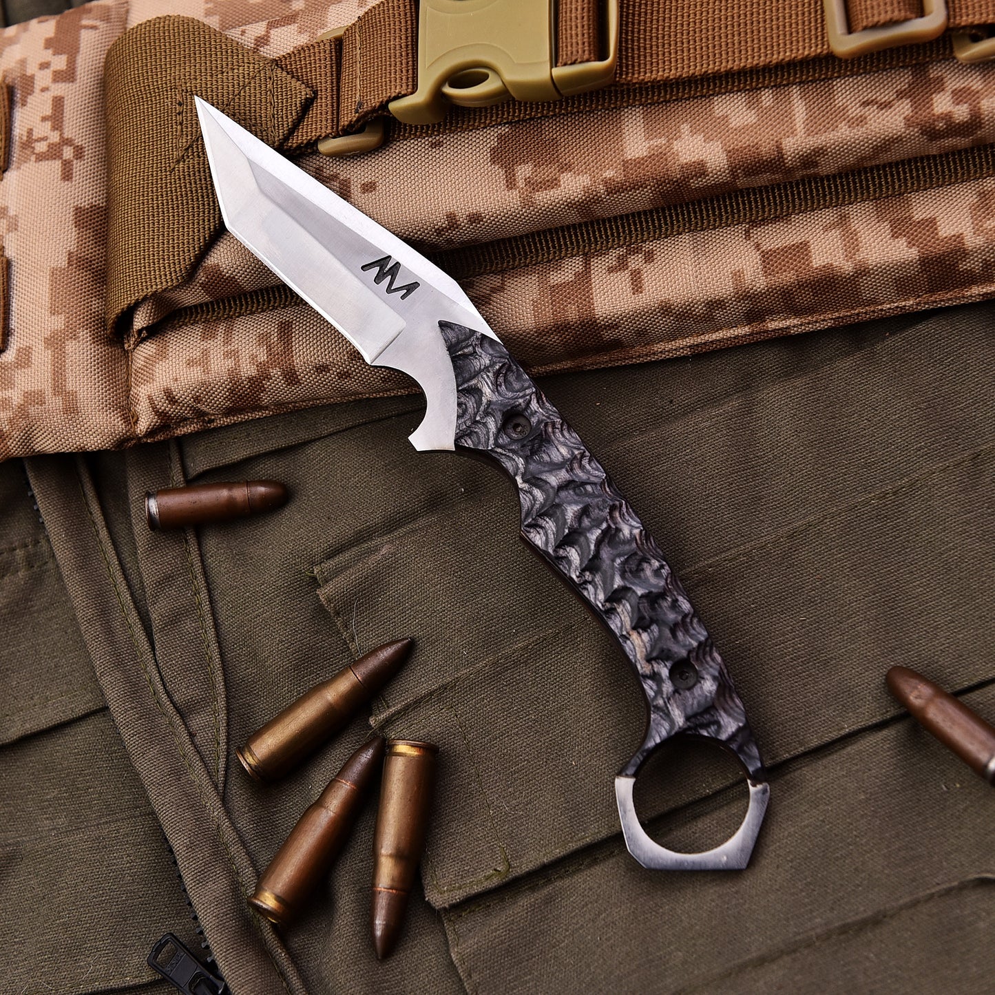 AM Sentinel tactical EDC surface with visible finger hole feature