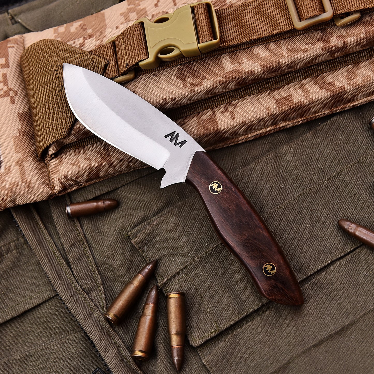 Top view of AM Titan fixed blade camping knife with ergonomic rosewood handle
