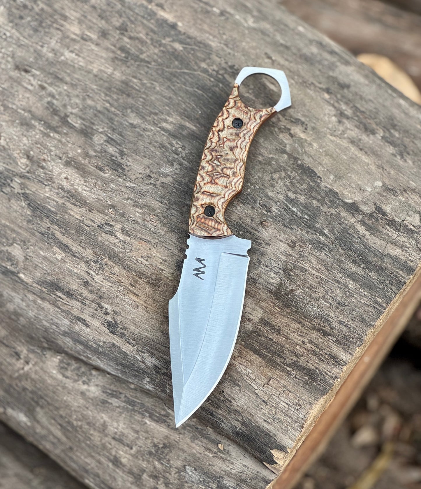 Hand crafted fixed blade knife with ring pommel