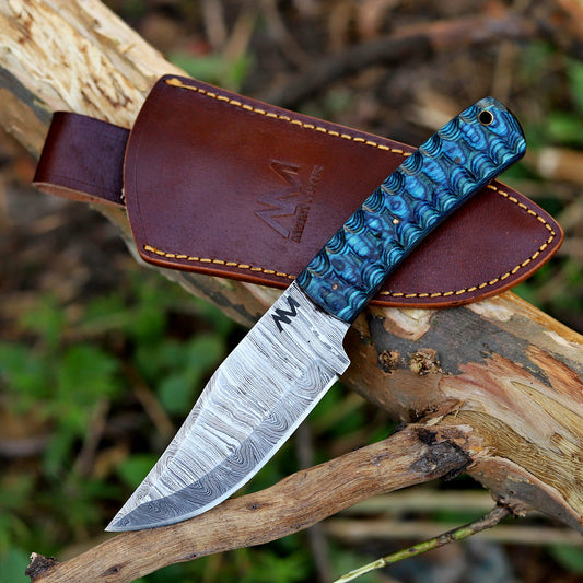 AM Helix Damascus knife paired with custom vertical carry leather sheath for outdoor use.