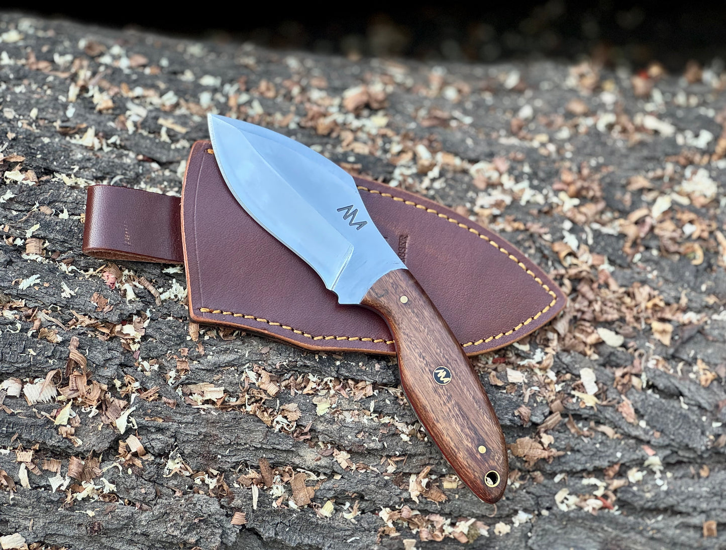 EDC fixed blade knife with handcrafted sheath for outdoor carry


