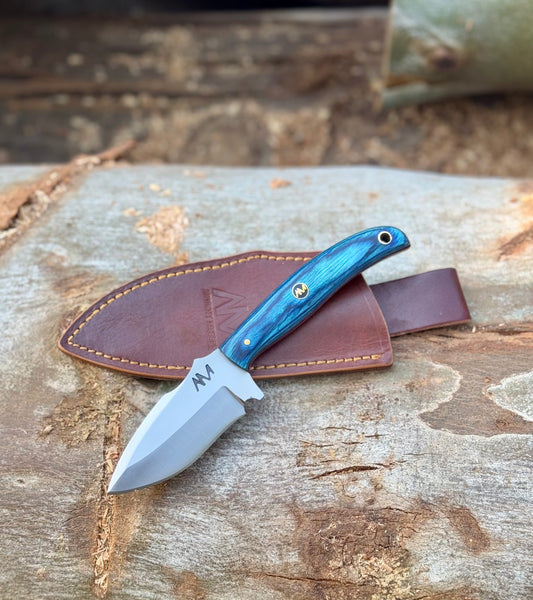 7.5" Fixed Blade Knife with 12c27 Steel and Striking Blue handle with a lanyard hole and branded mosaic pins, and a premium leather sheath