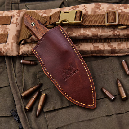 AM Titan hunting knife in leather sheath 

