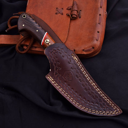 Knife with leather sheath on a dark background