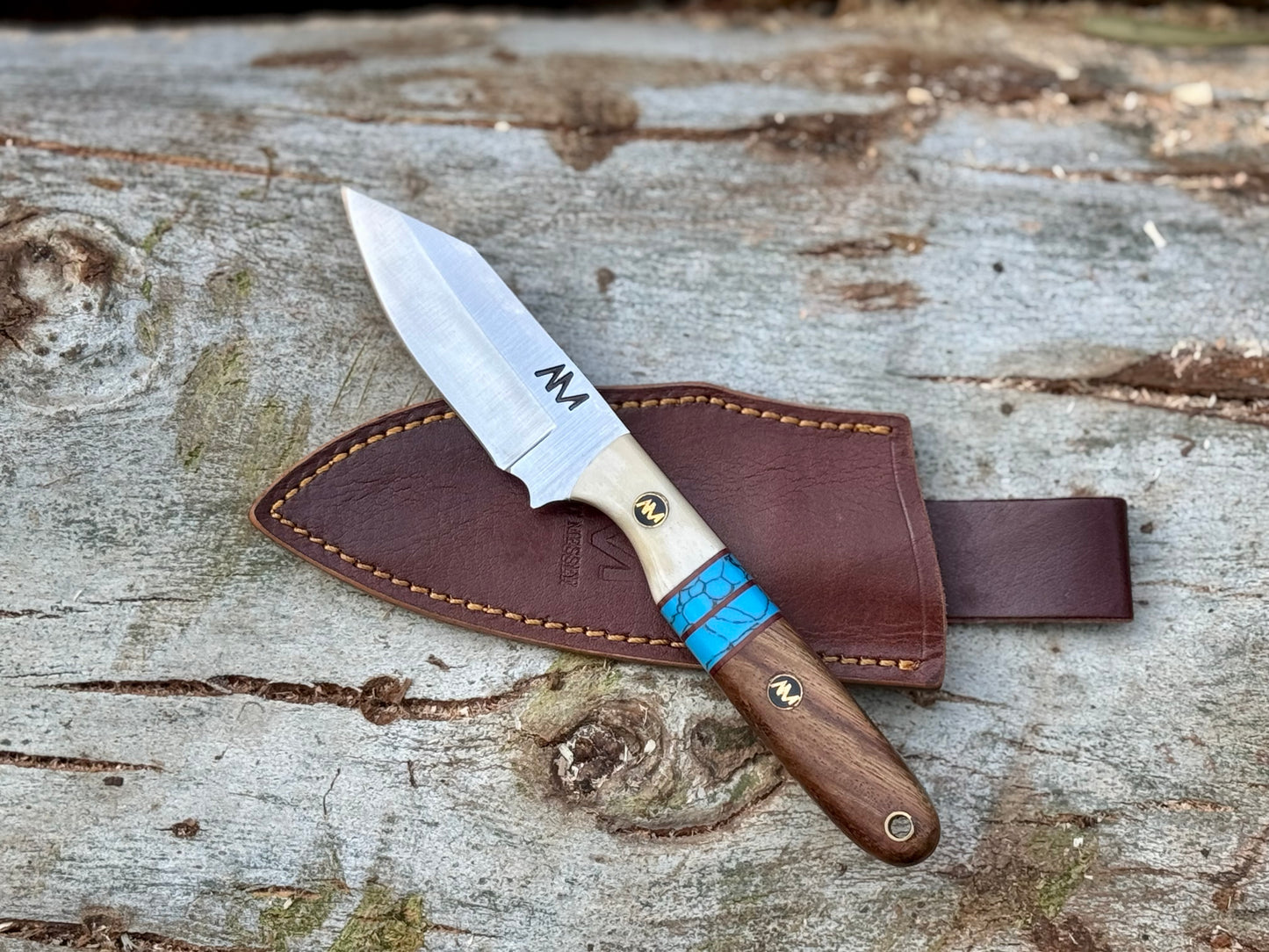 Outdoor fixed blade knife with protective sheath for camping and bushcraft utility