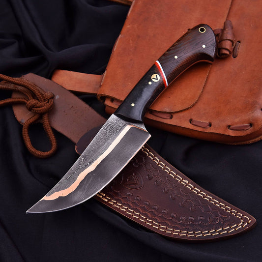 Copper Damascus knife with leather sheath side by side


